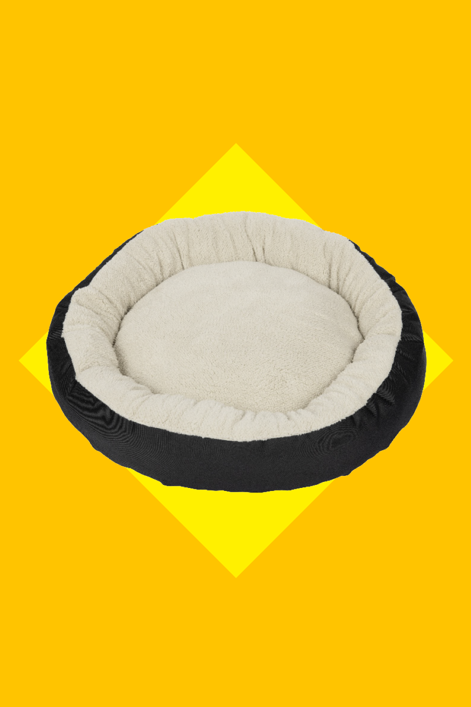 Juodas ir kreminės spalvos apvalus guolis naminiams gyvūnams.