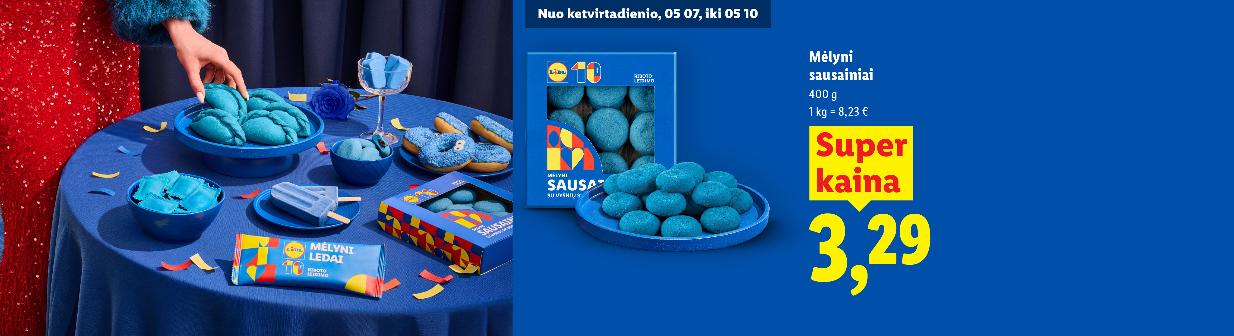 Mėlyni sausainiai, ledai ir spurgos ant stalo su konfeti, su užrašu „Super kaina 3,29“.
